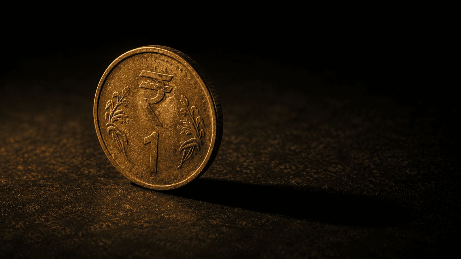 Dramatic amber-lit Indian rupee coin on dark background symbolising inflation eroding purchasing power of savings